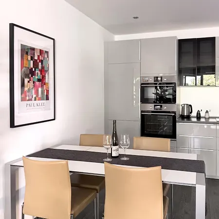 Апартаменты Modernes Wasserfront Wohnung, Terrasse, Parkplatz